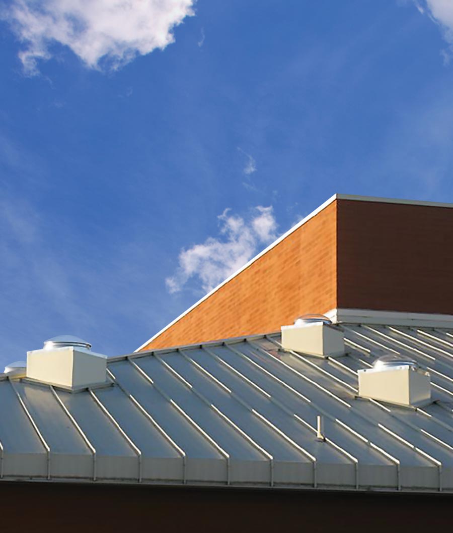3 Kennedy K series curb mount tubular skylights on metal roof 
